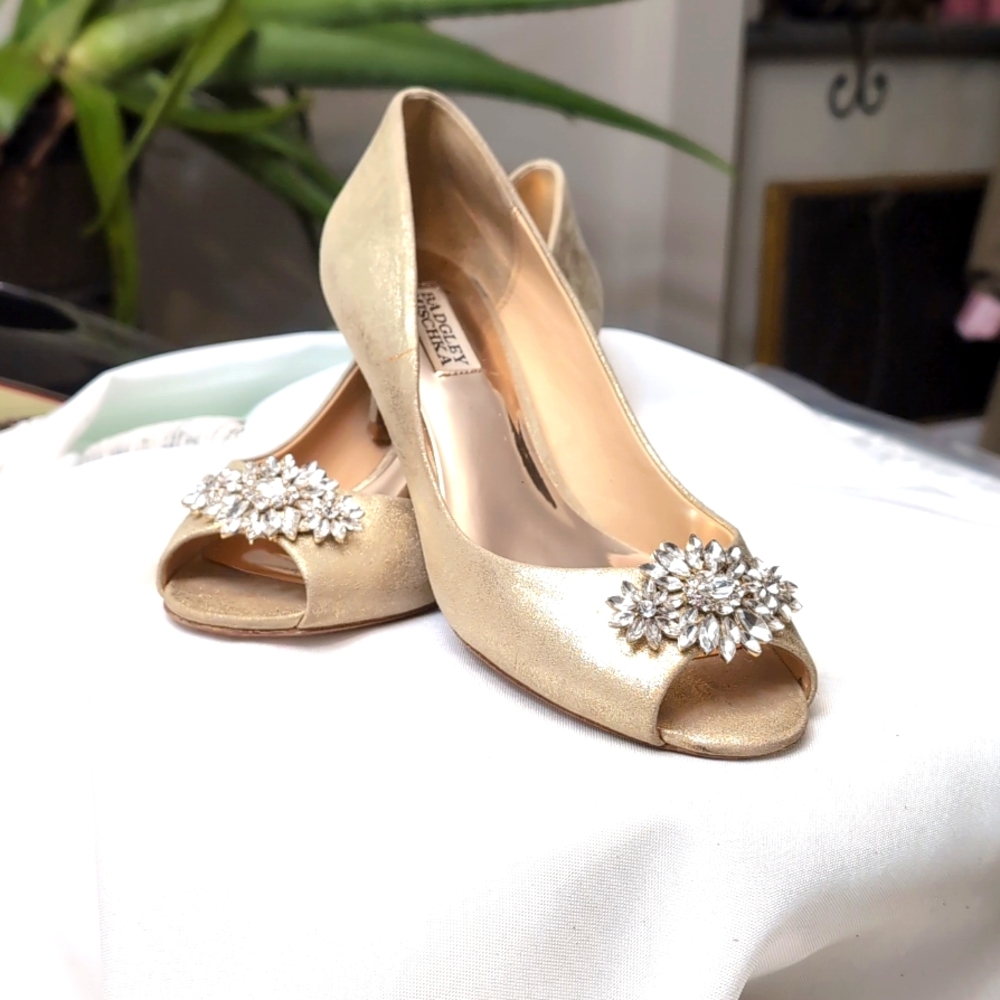 Badgley Mischka gold sparkle shoes.